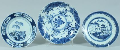 THREE CHINESE BLUE AND WHITE PLATES, two with floral decoration and one with a landscape scene, (all
