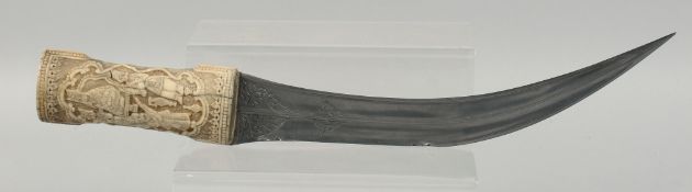 A VERY FINE LARGE EARLY 19TH CENTURY PERSIAN QAJAR BONE HILTED WATERED STEEL DAGGER, the bone hilt