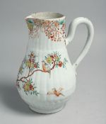 A CHINESE FAMILLE ROSE PORCELAIN JUG, painted with birds and native flora, 21.5cm high.