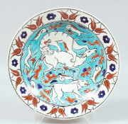 A 19TH CENTURY FRENCH SAMSON TURKISH IZNIK STYLE GLAZED POTTERY PLATE, the centre painted with