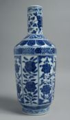 A CHINESE BLUE AND WHITE PORCELAIN VASE, pained with panels of floral motifs, the base with six-