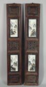 A PAIR OF EARLY 20TH CENTURY FRAMED DOUBLE PORCELAIN PANELS, each wooden frame encasing two panels