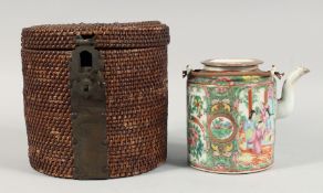 A CHINESE CANTON FAMILLE ROSE PORCELAIN TEAPOT AND COVER, in a fitted woven bamboo basket, teapot,