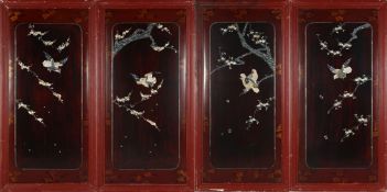 FOUR MOTHER OF PEARL AND ABALONE INLAID LACQUERED WOOD PANELS, each depicting birds and blossoming