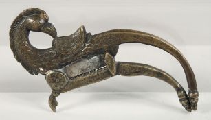 AN INDIAN BRASS BEETLE NUT CUTTER, 17cm long.