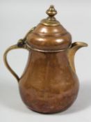 AN 18TH/19TH CENTURY OTTOMAN TOMBAK GILT COPPER COFFEE POT, the inner lid with traces of gilt, 14.