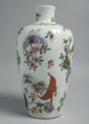 A CHINESE FAMILLE ROSE PORCELAIN BUTTERFLY VASE, painted with numerous colourful butterflies and