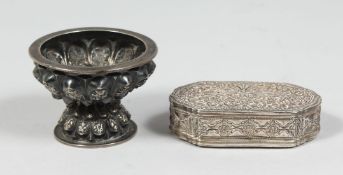 A SRI LANKAN SILVER BOX with hinged lid and embossed decoration, 9cm x 5.5cm, together with a Thai