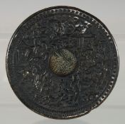 A CHINESE ANTIQUE CARVED TORTOISESHELL CIRCULAR BOX AND COVER, the lid carved with a busy village