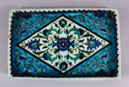 A 19TH CENTURY OTTOMAN TURKISH KUTAHYA POTTERY TRAY, decorated in Iznik style with floral motif