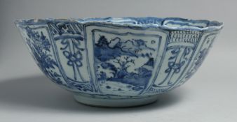 A LARGE CHINESE MING DYNASTY KRAAK WARE PORCELAIN BOWL, the bowl decorated with a variety of blue