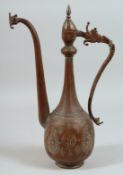 A FINE 18TH CENTURY PERSIAN SAFAVID COPPER EWER, with stylised dragon shaped handle and spout, the