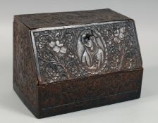 A PERSIAN QAJAR CARVED WOOD STATIONARY BOX, well carved with hunting scenes, Nasir Al-Din portrait
