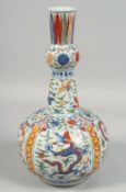 A CHINESE WUCAI PORCELAIN VASE decorated with panels of dragons as well as cranes and flora, the