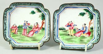 A PAIR OF CHINESE SQUARE FORM ENAMELLED DISHES, decorated with figures in a garden, 9.5cm square.