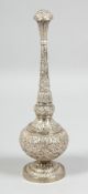 A GOOD INDIAN SILVER ROSEWATER SPRINKLER, with embossed and chased foliate decoration all over, 23cm