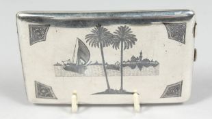 AN IRAQI NIELLO SILVER SIGNED CIGARETTE CASE, decorated with a river scene, 13cm x 8cm.