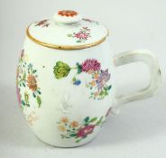 A CHINESE FAMILLE ROSE PORCELAIN CUP AND COVER, painted with floral sprays, 11cm high.