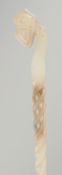 A CHINESE CARVED AND PIERCED JADE HAIR PIN, 23.5cm long.