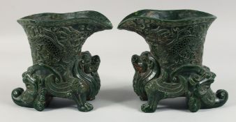 A LARGE AND IMPRESSIVE PAIR OF HEAVY CHINESE CARVED GREEN JADE LION CUPS, the upper vessel carved in