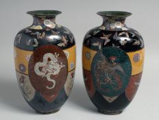 A PAIR OF JAPANESE CLOISONNE VASES, decorated with a central panel to each side with a dragon and