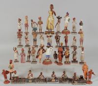 A LARGE COLLECTION OF INDIAN SCHOOL CARVED WOODEN FIGURES, of various subjects, shapes and sizes, (