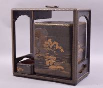 A 19TH CENTURY JAPANESE LACQUER PICNIC BOX with gilt decoration, the box containing four stacking