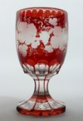 A GOOD BOHEMIAN GOBLET ENGRAVED WITH FRUITING VINES on an octagonal base. 5.5ins high.