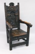 A GOOD 19TH CENTURY REPLICA OF A 14TH / 15TH CENTURY OAK ARMCHAIR carved with figures, emblems and