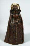 AFTER THE ANTIQUE. A GOOD 19TH CENTURY BRONZE BELL, AN ELIZABETHAN LADY with two rings holding a
