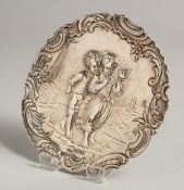 A CONTINENTAL SILVER DISH repousse with children. 4ins diameter. London imported mark, 1910.