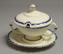 A CREAMWARE TUREEN AND COVER with stand, possibly LEEDS.