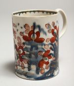 A LIVERPOOL MUG, probably Wm. Reid, painted in an underglaze blue and over glaze red with a tree and