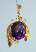 A GOOD AMETHYST PENDANT in an 18ct gold mount.