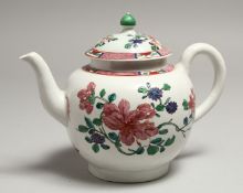 A CHRISTIANS LIVERPOOL TEA POT AND COVER painted in famille rose style with trailing flowers under a