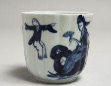A CHAFFERS FLUTED COFFEE CUP painted with the Jumping Boy in under glaze blue.