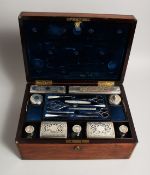 A GOOD WILLIAM IV BRASS MOUNTED ROSEWOOD VANITY BOX with silver top boxes and bottles, complete with
