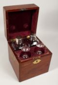 A 19TH CENTURY MAHOGANY CASED PAIR OF DECANTERS AND PAIR OF GLASSES. The square case inset with