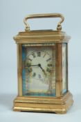 A MINIATURE FRENCH BRASS SEVRES DESIGN CLOCK 3ins high.