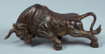 A CHINESE BRONZE FIGHTING BULL 9.5ins long.