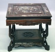 A CHINESE SQUARE TWO TIER TABLE inlaid with mother of pearl. 23ins square.