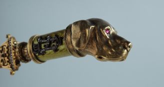A SUPERB RUSSIAN AND SILVER GILT ENAMEL SPORTING DOG'S HEAD HANDLE PAPER KNIFE set with diamonds.