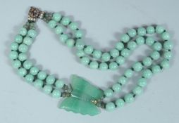 A JADE BUTTERFLY NECKLACE.
