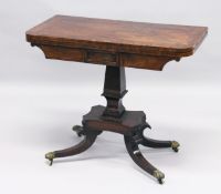 A REGENCY MAHOGANY CARD TABLE with cross band top and green baize interior, on a centre column