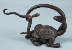 A CHINESE BRONZE SNAKE attacking a tortoise. 9.5ins long.