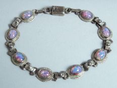 A SILVER AND OPAL BRACELET.