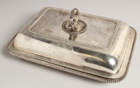 A GOOD GEORGE III SILVER ENTREE DISH, COVER AND HANDLE with gadrooned edge, with Walker Family crest