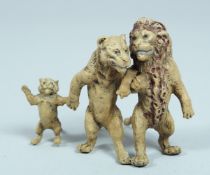 A COLD CAST BRONZE LION GROUP. 3ins long.