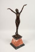AFTER D. CHIPARUS. A BRONZE DANCER on a marble base. Signed. 22ins overall.