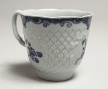 A Wm. REID RARE LIVERPOOL COFFEE CUP with a scale moulded body, moulded cartouches, painted with